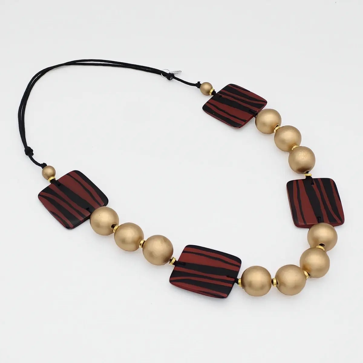SYLCA Gold Wood and Animal Print Statement Necklace