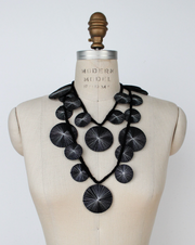 BEYOND THREADS Black Platillos Wrap Necklace