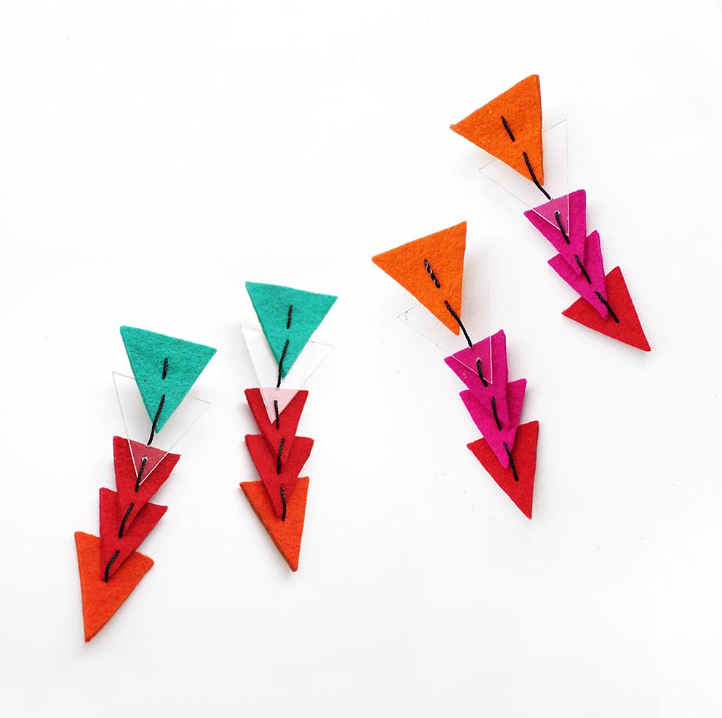BEYOND THREADS Multi Arrow Earrings