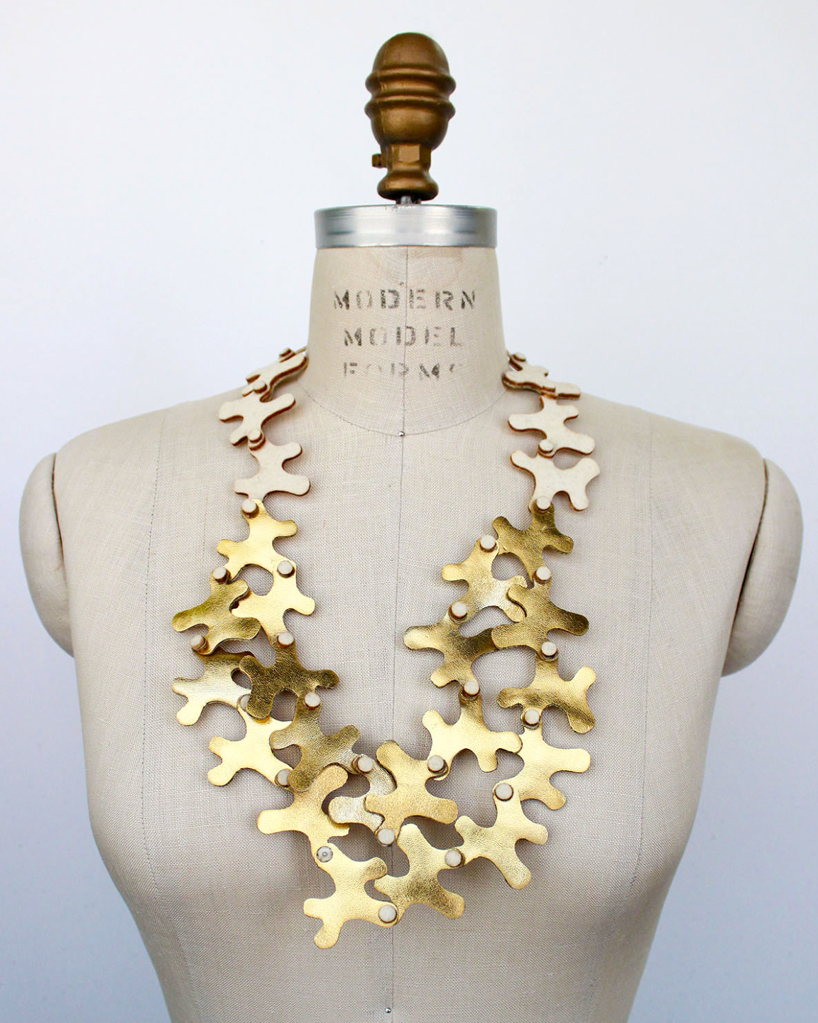 BEYOND THREADS Ivory Puzzle Necklace
